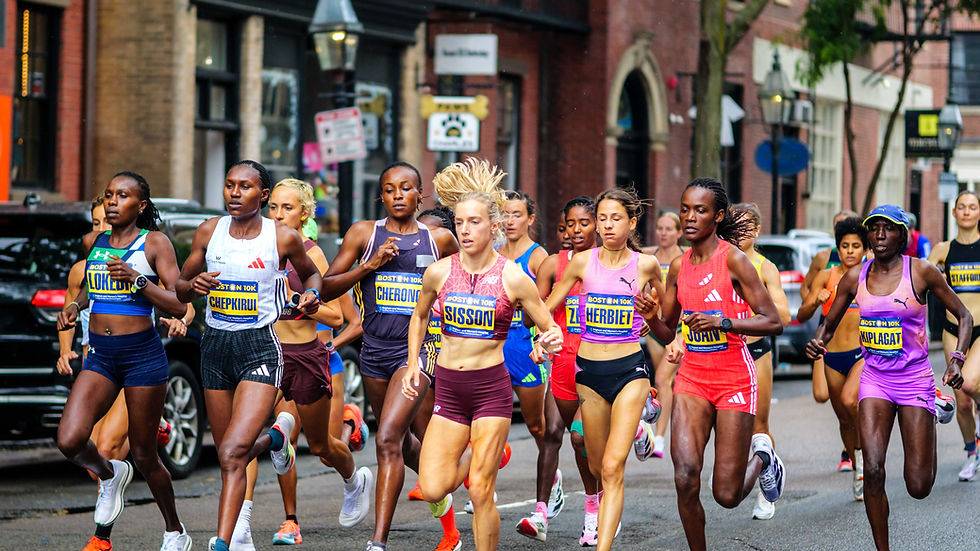Runners in the women's elite field (including eventual winner Sharon Lokedi) on Charles Street at the early stage of the Boston 10K on Sunday June 22, 2025.
