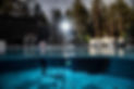 Film shoot in outdoor swimming pool