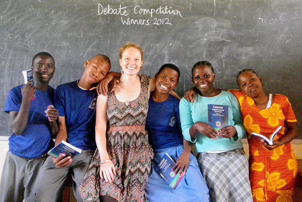 Kabisa's founder Vics with her students on the Debating Team.jpg