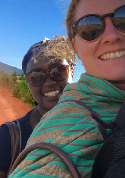 Kabisa's founder Vics and Operations Manager Rosie visiting projects on the back of a motorbike in the Kenyan bush
