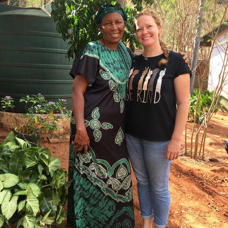 Vics and Mama Mercy enjoying the natural surroundings of rural Kenya.