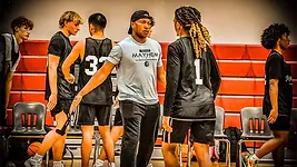 Coach Elijah Pruitt of Texas Mayhem, a former professional player in London and pastor, mentoring young athletes with experience, leadership, and spiritual values