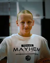 Girl taking picture at Texas Mayhem Camps