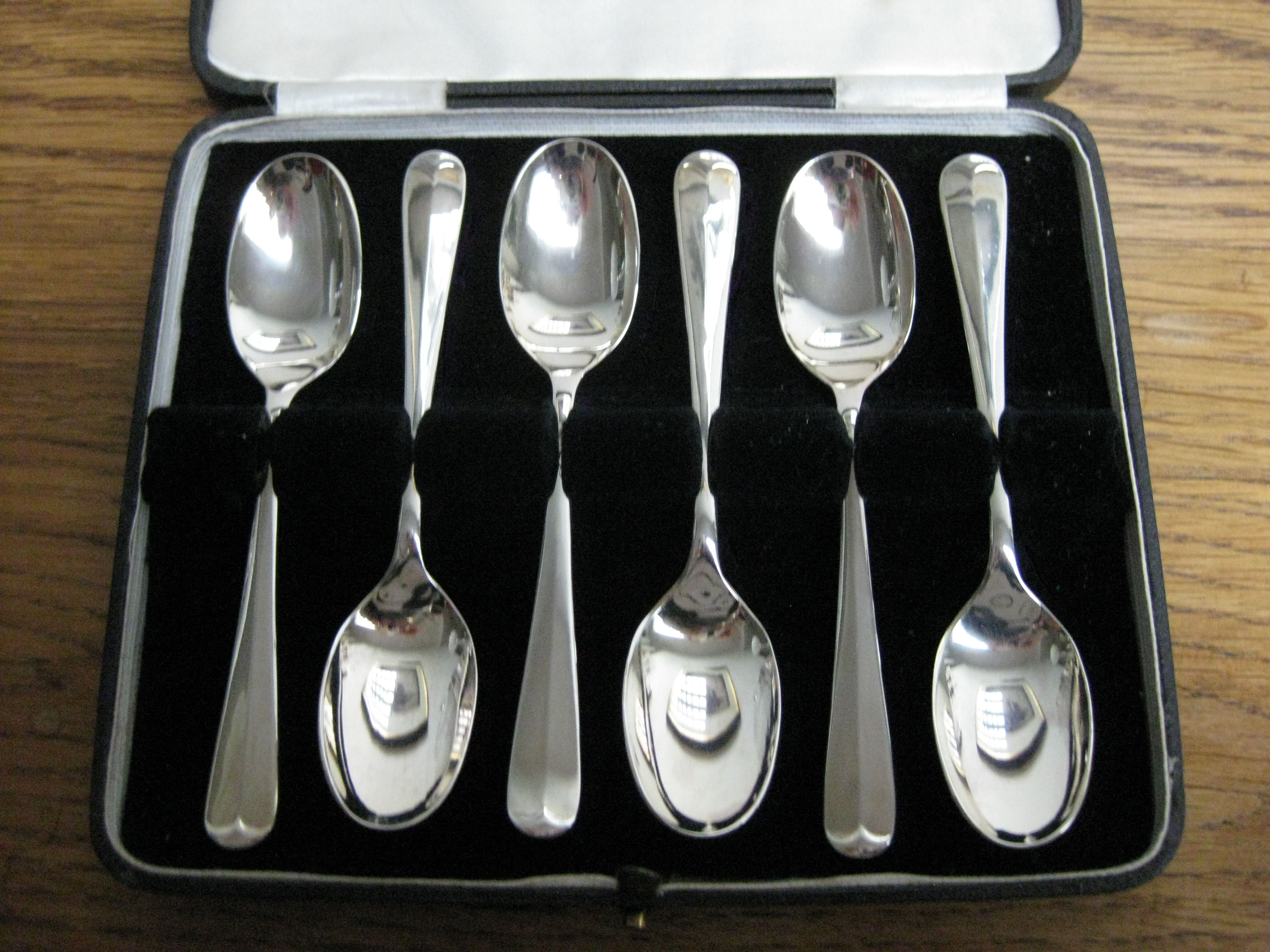 Zes verzilverde koffielepeltjes, Haags Lofje