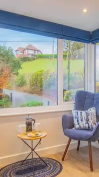 Chair by window with view