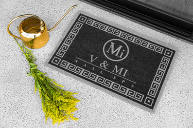 mockup-of-a-doormat-placed-by-some-gardening-stuff-m19112