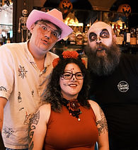 3 team members of Beer & Loathing with Day of the Dead themed face paint
