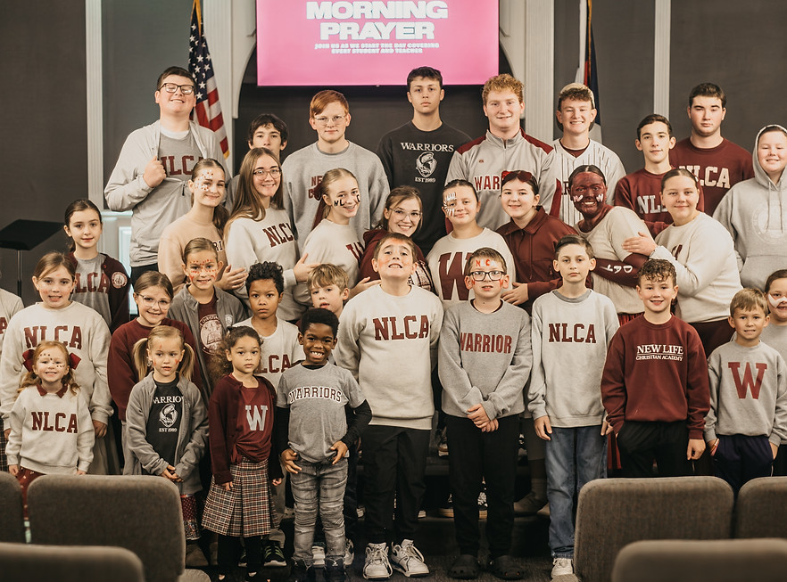 Private Christian education students at morning prayer