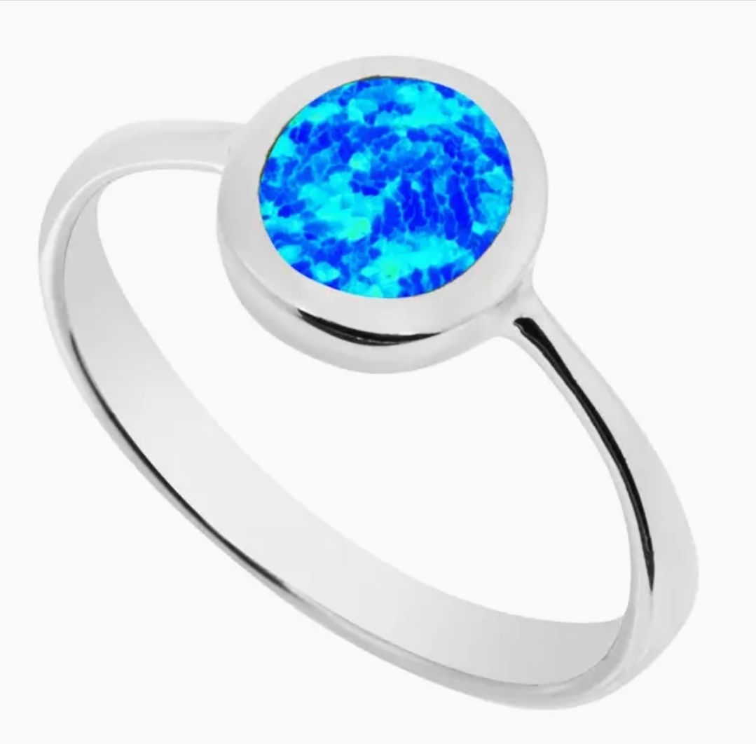 Blue opal silver 925 ring on white background