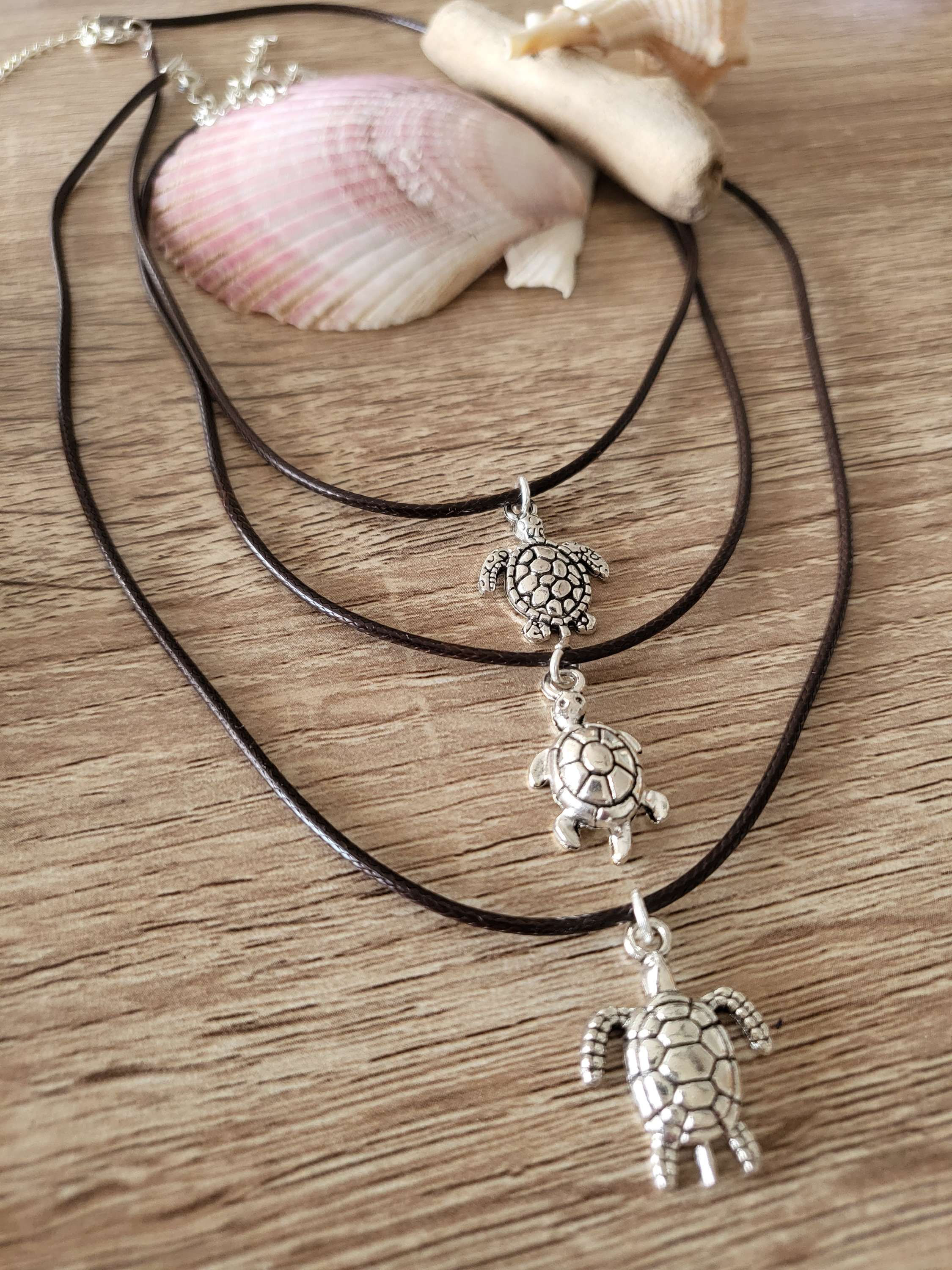 Cute Sea Turtle charm necklace pendant on black soft leather cord