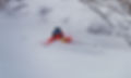 Skier riding through chest-deep powder in Hokkaido Japan