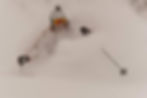 close up of a skier riding through dep powder snow in Japan