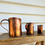 Thumbnail: Trio of Antique Copper Measuring Jugs