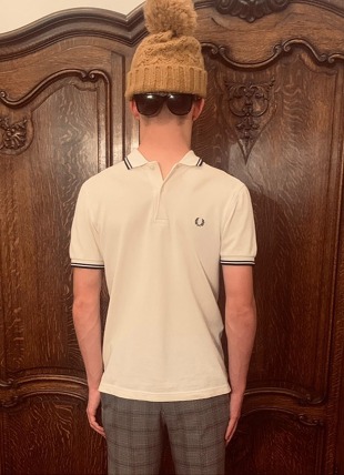 man facing backwards with clothes on the wrong way round