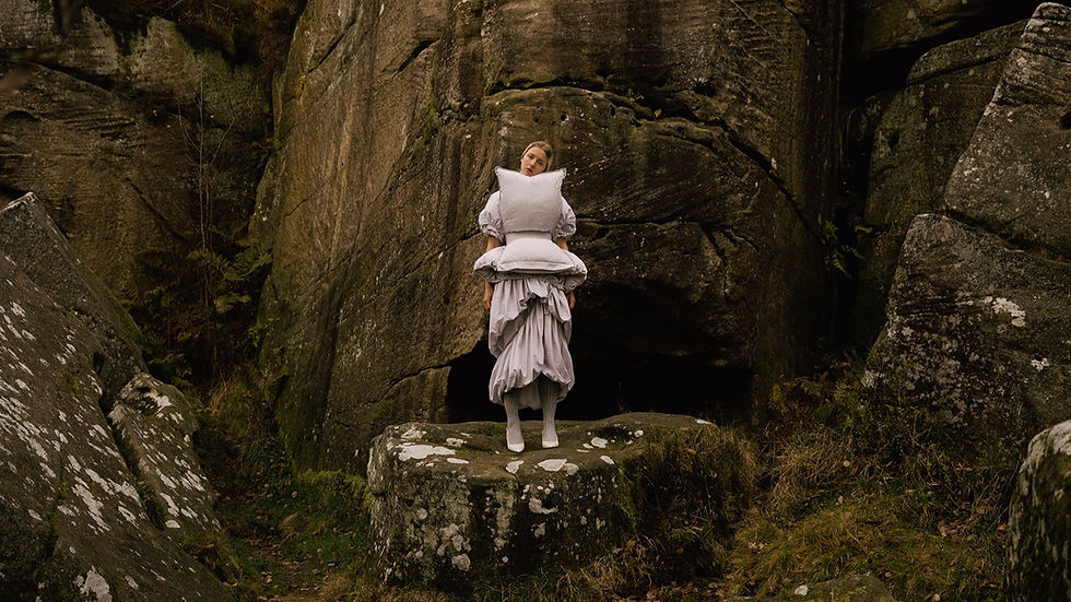 model wearing the pillow dress standing in nature