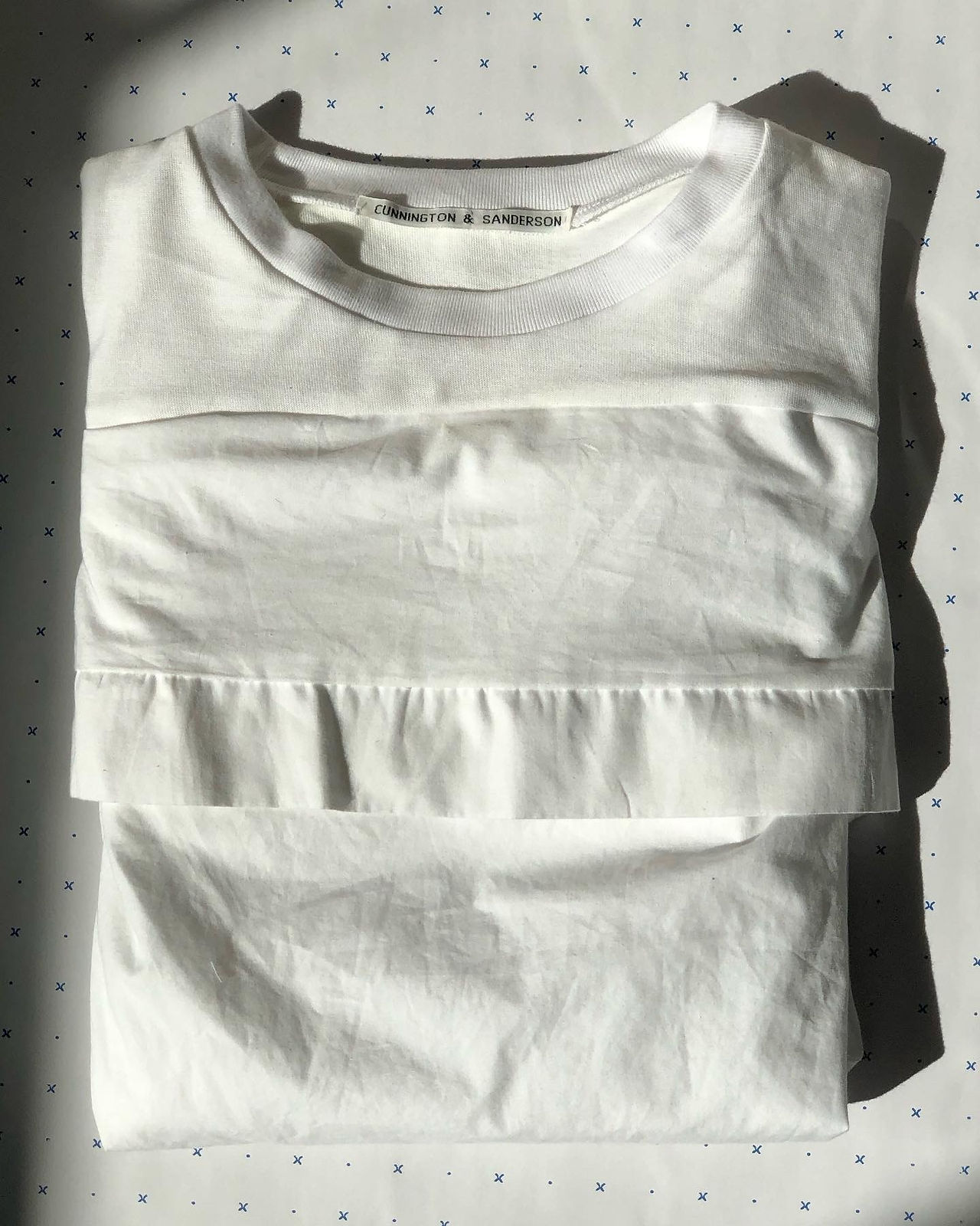 White organic cotton pillow t-shirt by Cunnington and sanderson in the sun