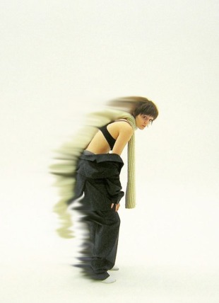 model expressing movement with her clothes and digital fashion