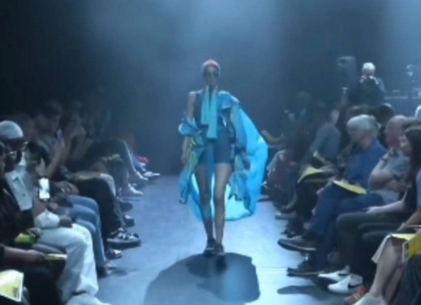 model on catwalk at the Leeds Beckett graduate fashion show run