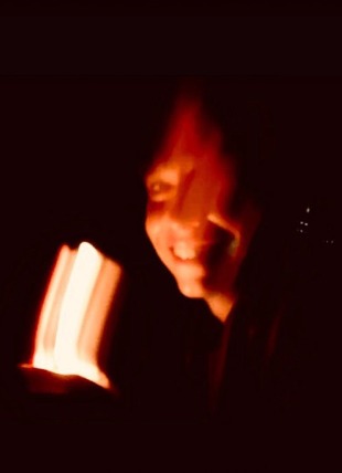 person in the dark with blurred light for the wear emotion challenge