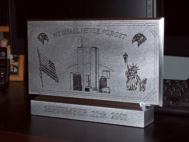 WE SHALL NEVER FORGET