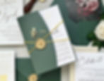 Green wedding invitation with wax seal