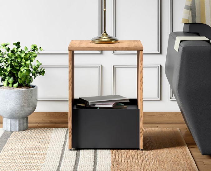 Jaxon wooden side table with black storage in a modern room