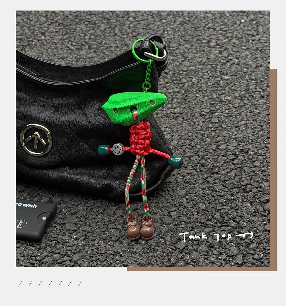 Thumbnail: Fennec Crag Buddy 3D Keychain on a black leather bag