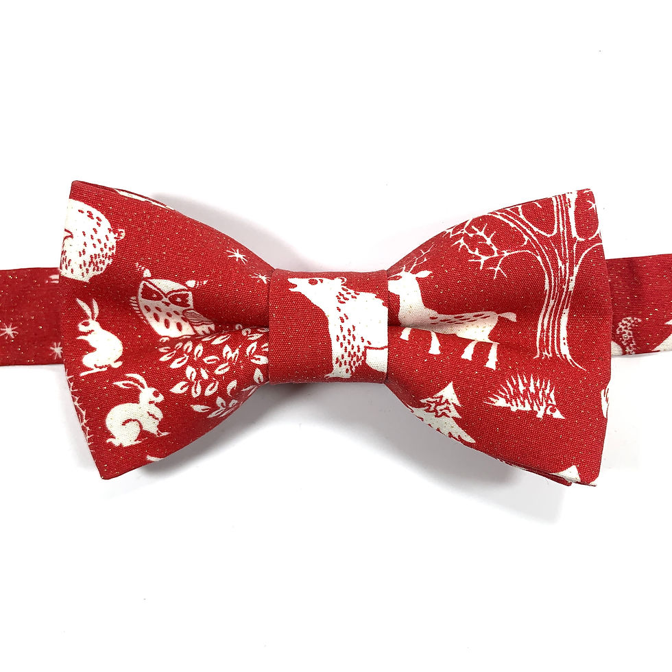 Noeud papillon rouge aux motifs d'animaux de la forest blancs et paillettes ors.