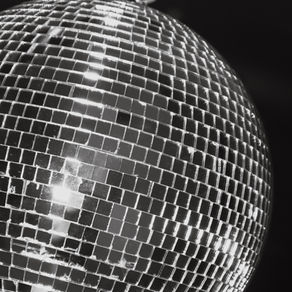 Disco ball on dance floor of wedding reception