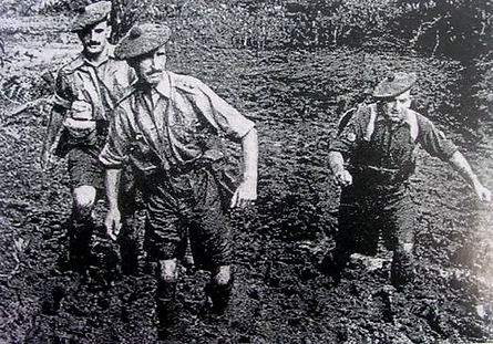 Two Argyll & Sutherland Highlanders soldiers on patrol in the Malayan jungle