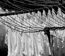 dirty cloth diapers being washed