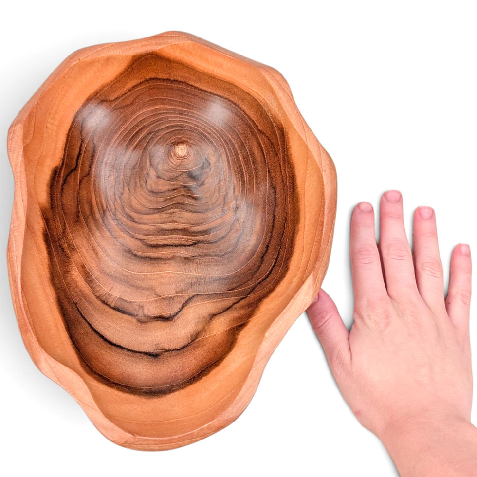Thumbnail: Handmade teak snack bowl with a shallow curved interior.