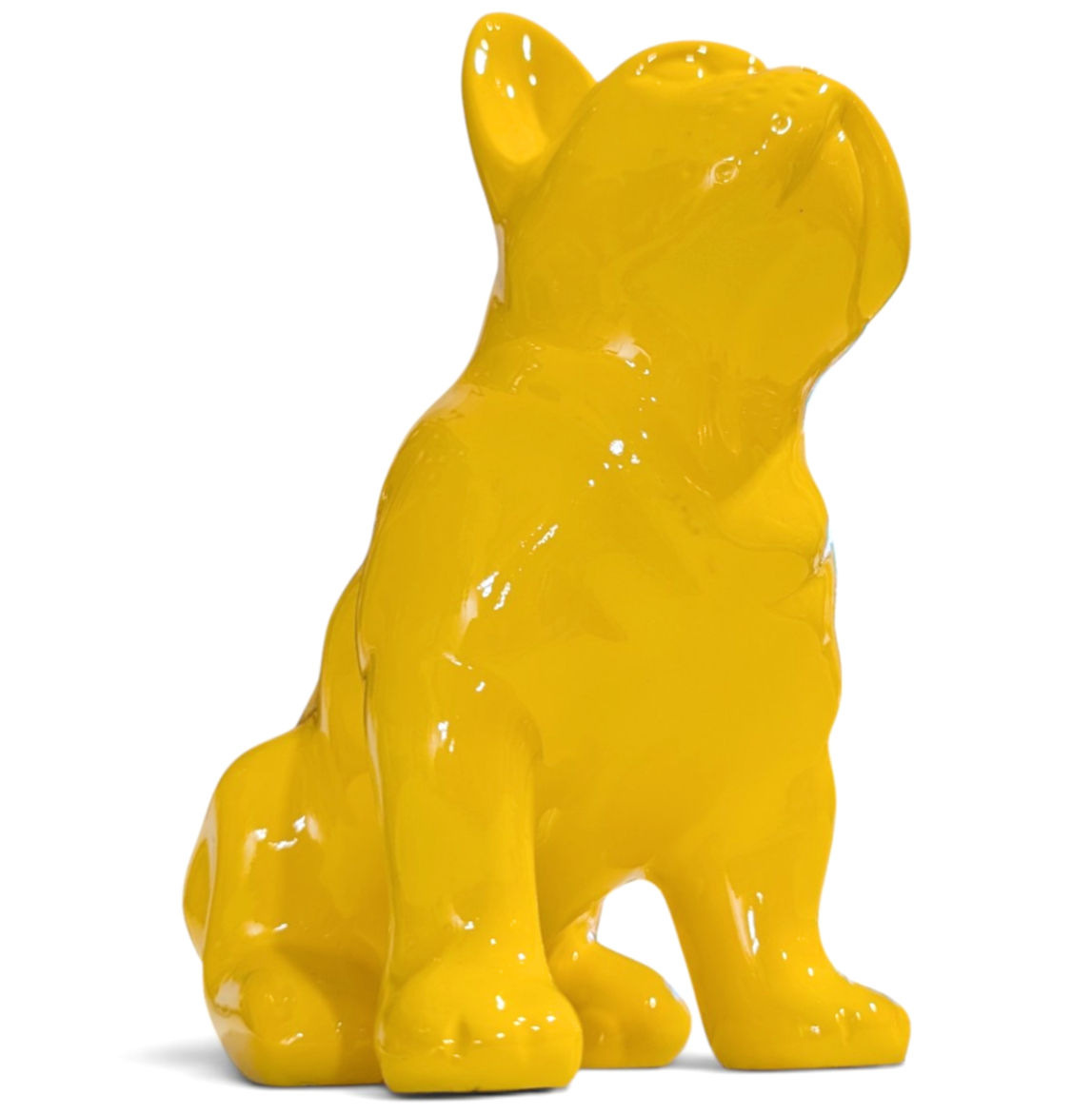 A glossy bulldog figurine on a flat surface.
