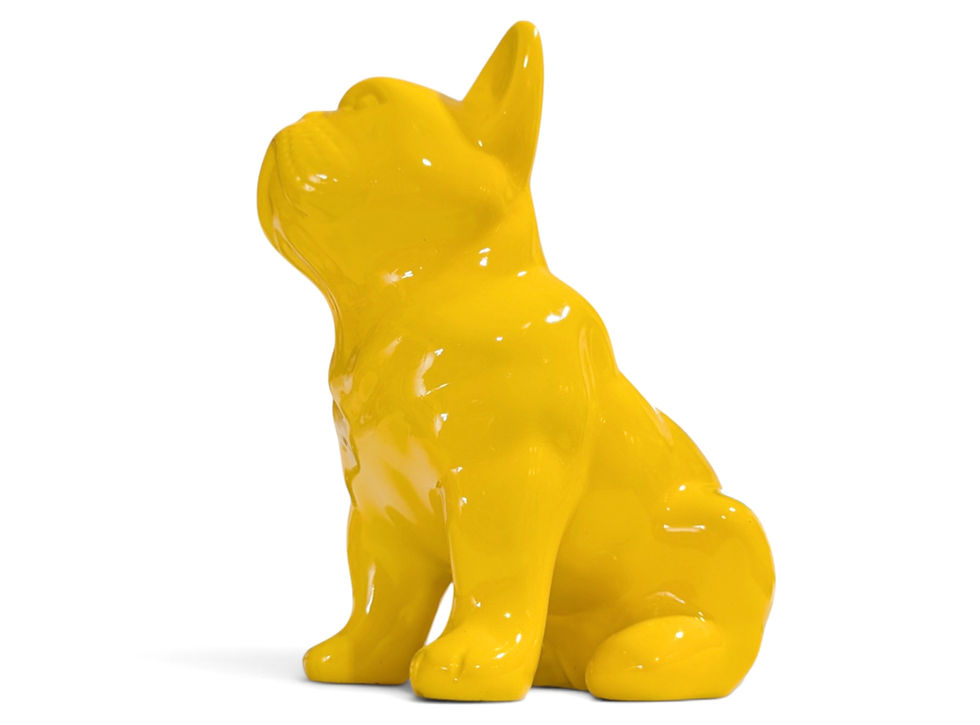 A glossy bulldog figurine on a flat surface.