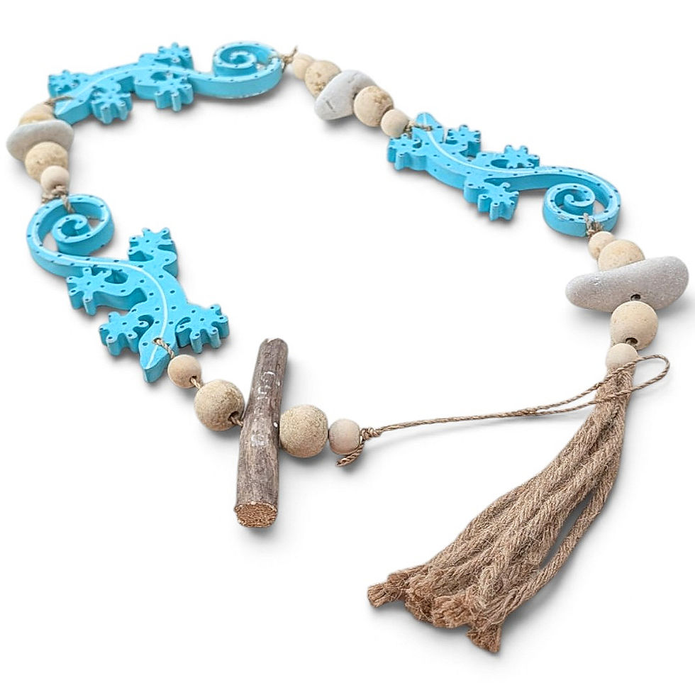 Beaded gecko garland featuring assorted rounded wooden beads