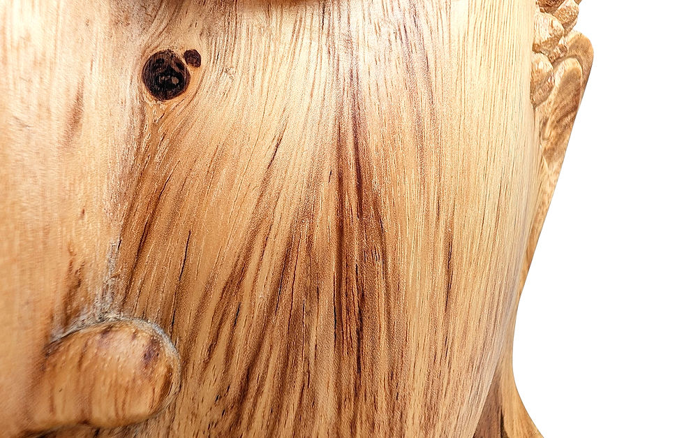 Thumbnail: Detailed wooden Buddha head with textured curls surrounding the face.