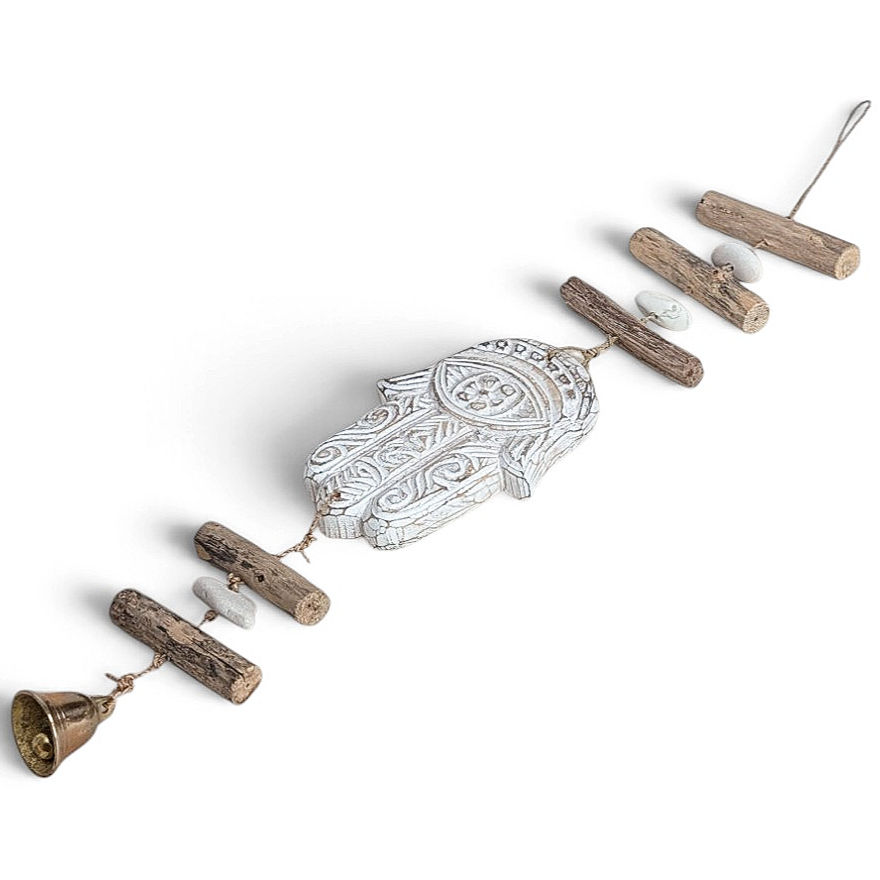 Thumbnail: Spiritual vertical decoration featuring a white Hamsa hand sculpture.