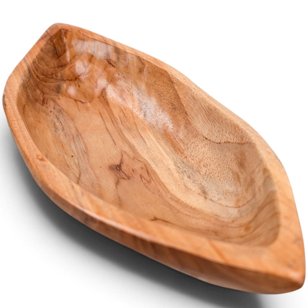Textured teak nut bowl with a shallow basin and tapered boat-shaped ends