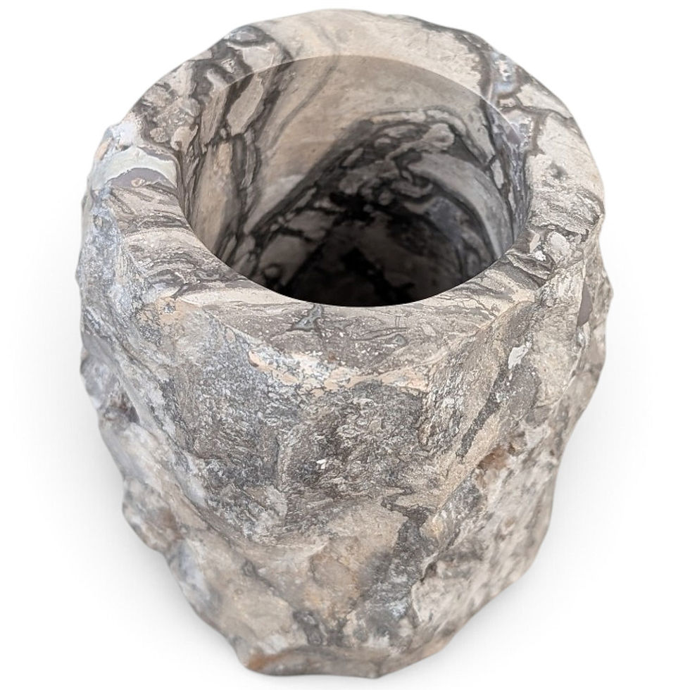 Thumbnail: A minimalist stone textured toothbrush container.