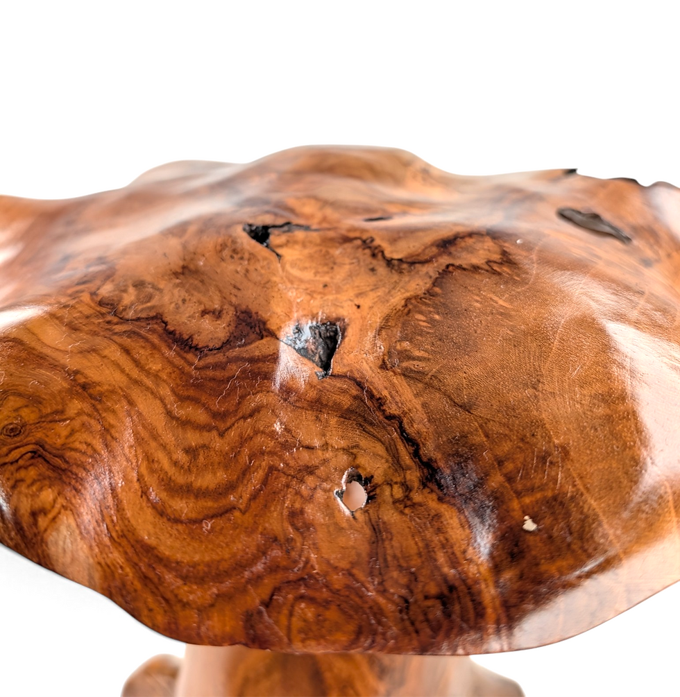 Thumbnail: Oversized rustic garden sculpture shaped like a toadstool with natural wood grain patterns.