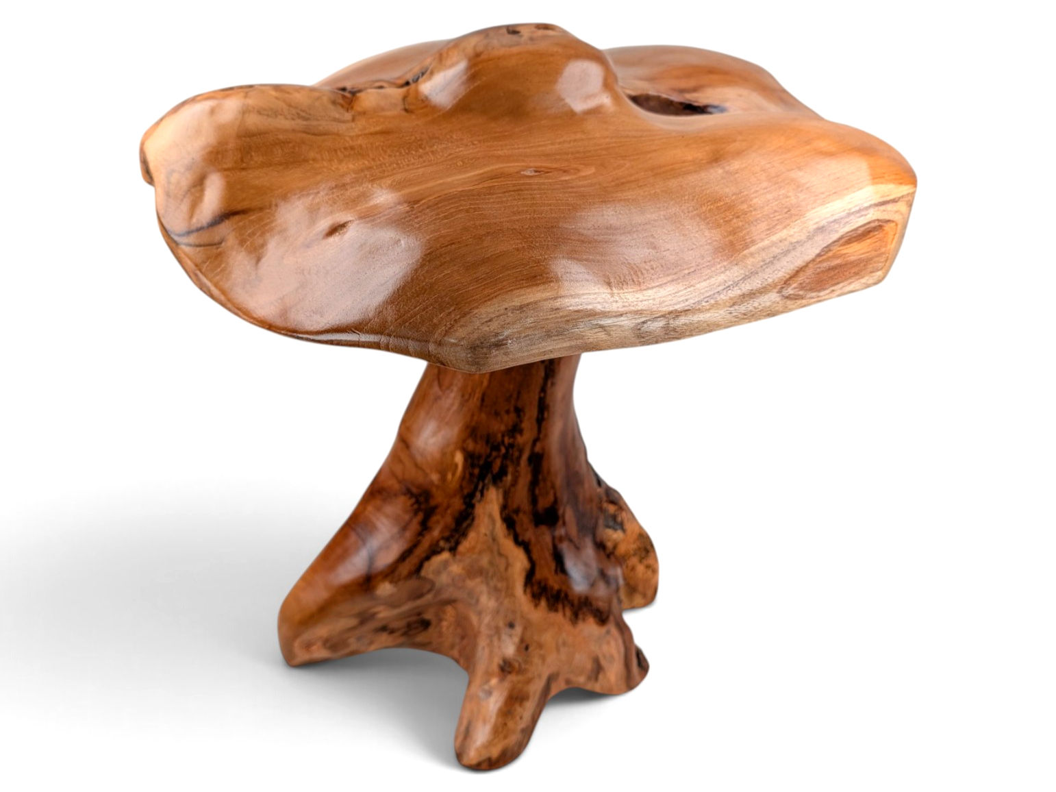 Hand-carved teak wood mushroom sculpture showcasing natural organic shapes.