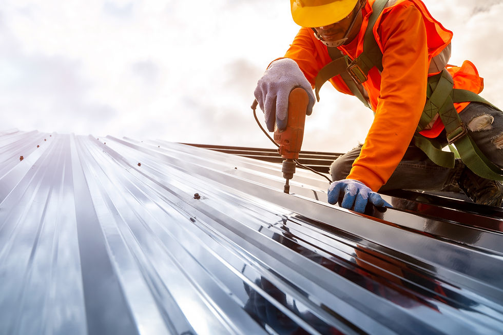 Construction worker install new roof,Roofing tools,Electric drill used on new roofs with M