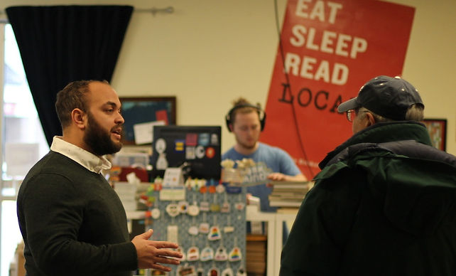 Joseph Alfonso speaking to a constituent.