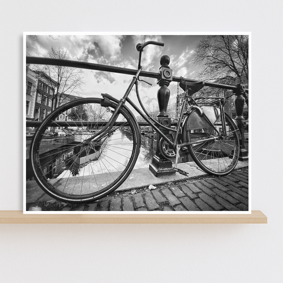Black and white photo print of Dutch bike on canal in Amsterdam, Netherlands