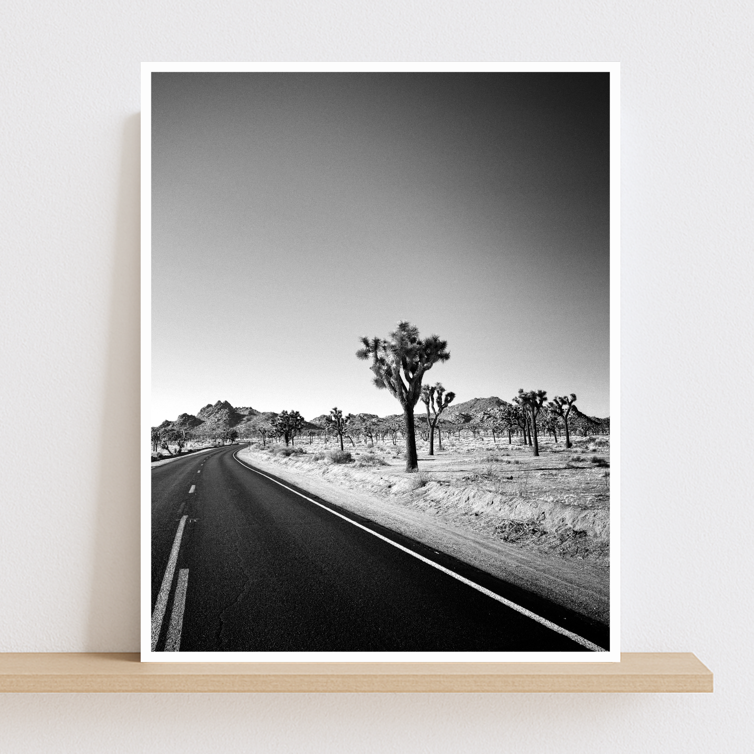 Black and white photo print of empty road in Joshua Tree National Park