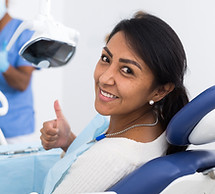 Dentist and patient.