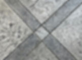 Heavy Stone Texture stamped concrete pattern with border in the shape of an X.
