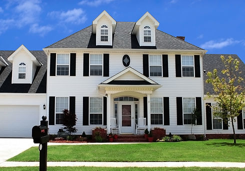 White house with new siding.