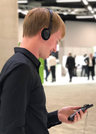 Silent conference headphones and receiver in use