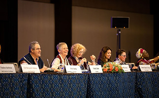 delegates using conference microphones